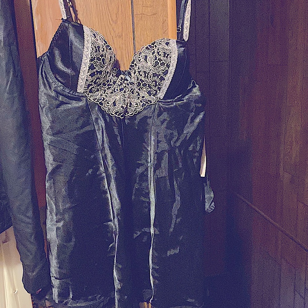 Never worn Two piece set black size medium. Has matching thong.